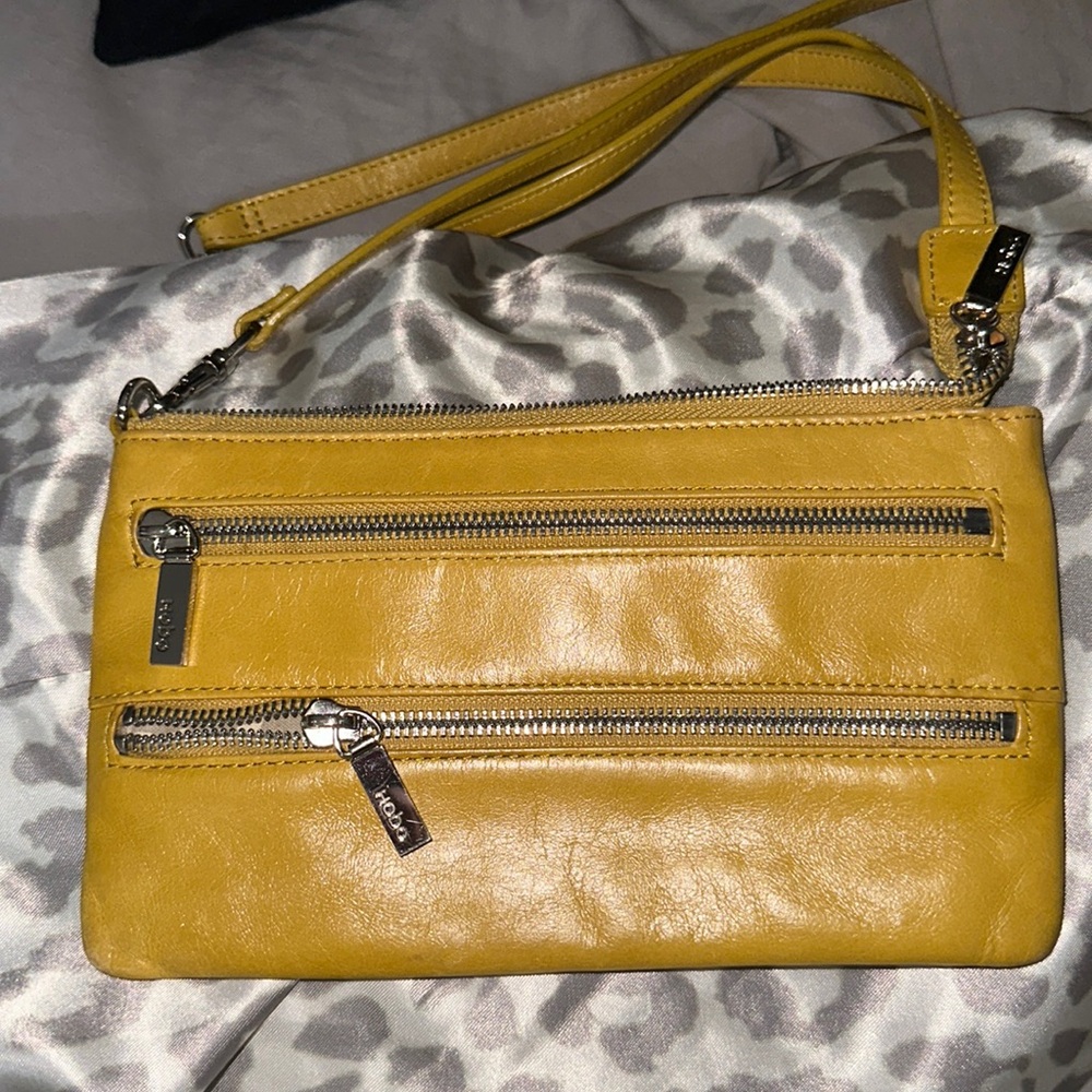 NWOT hobo gold leather crossbody with silver hardware bag with 2 pockets and 1 b
